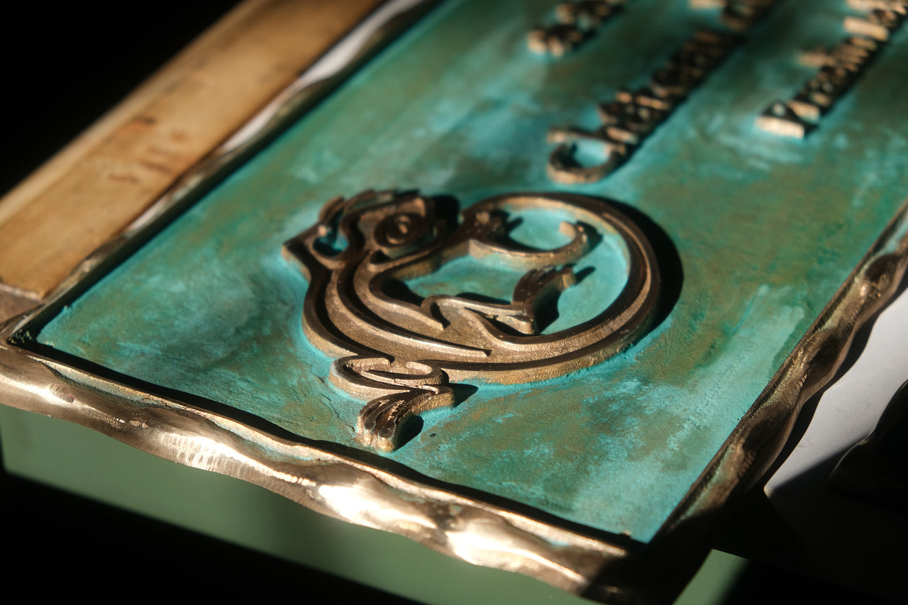 Hot cast tin bronze plaques